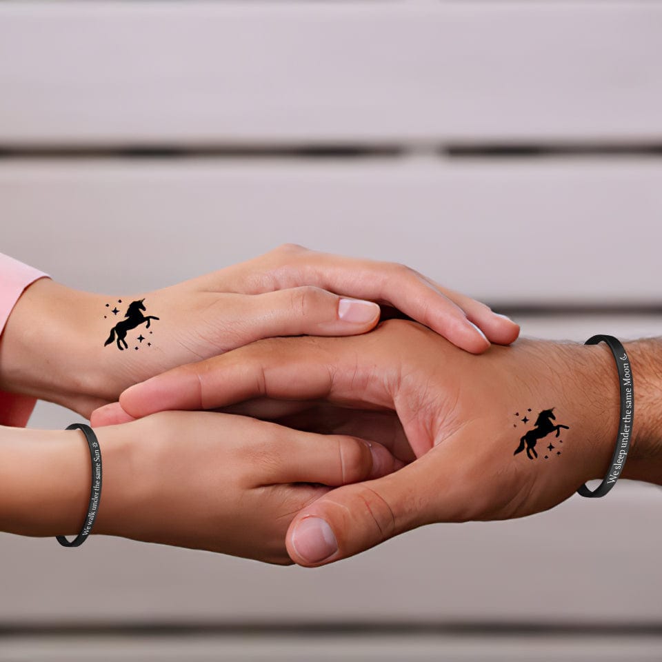 Floral bracelet tattoo with a bird - Tattoogrid.net
