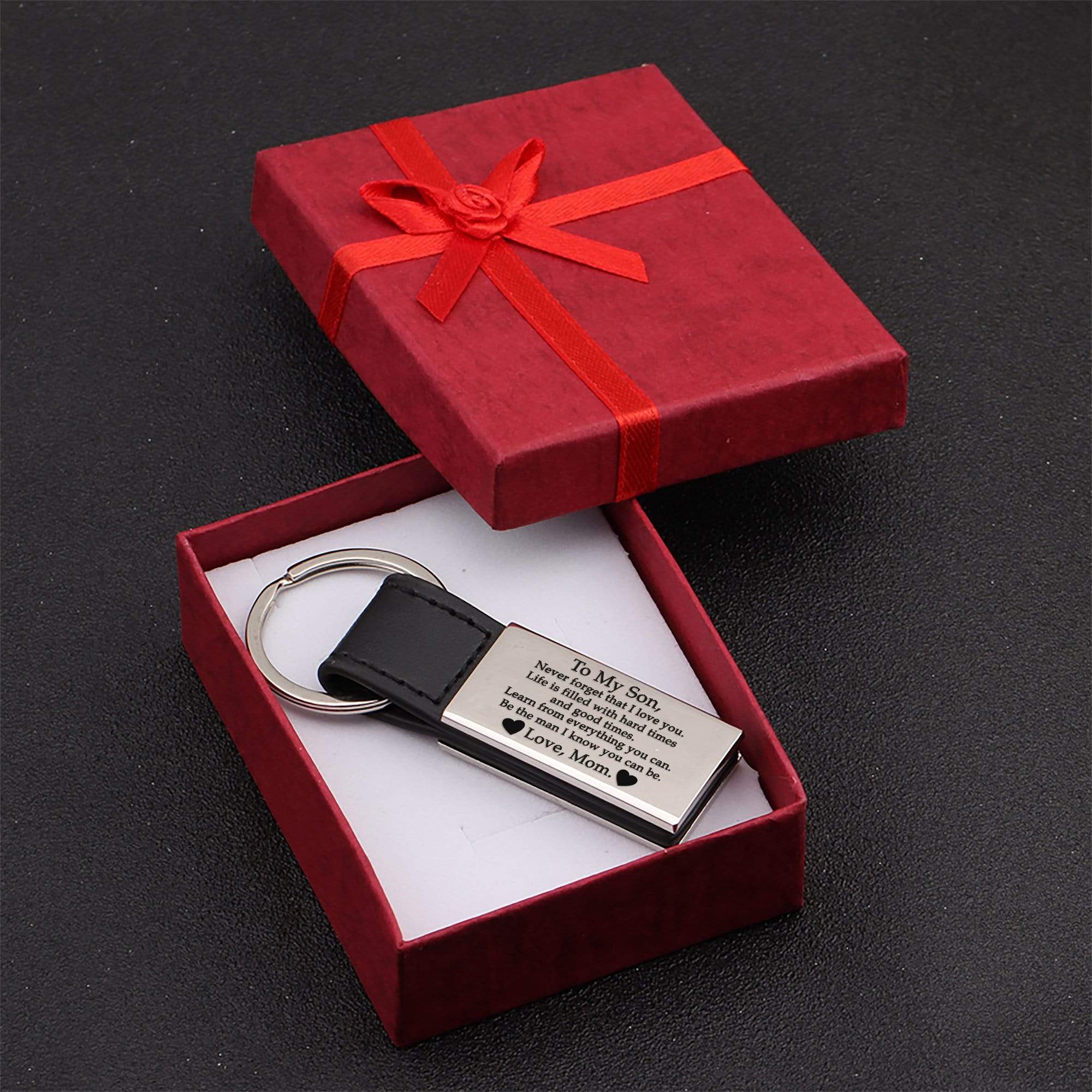 https://wrapsify.com/cdn/shop/products/engraved-keychain-to-my-son-love-mom-gkd16004-15378658263153_5000x.jpg?v=1628454536